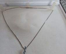 silver chain and pendant