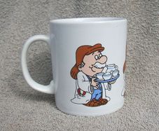 TETLEY TEA FOLK (Kilncraft STL) - a collectible mug showing three Tetley Tea Folk characters (early 1990s)