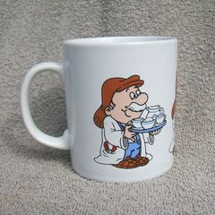 TETLEY TEA FOLK (Kilncraft STL) - a collectible mug showing three Tetley Tea Folk characters (early 1990s)