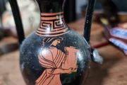 Three decorative Greek vase ornaments