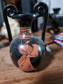 Three decorative Greek vase ornaments