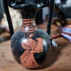 Three decorative Greek vase ornaments