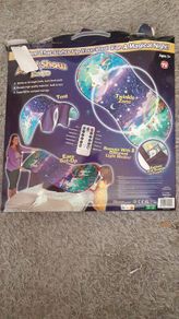 The tent that lights up your bed for a magical night