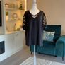 Ladies Black Short-sleeve Top Features Sheer polka-dot mesh sleeves Image 4