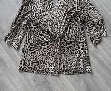 ladies top  shiny design all through it