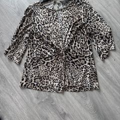 ladies top  shiny design all through it
