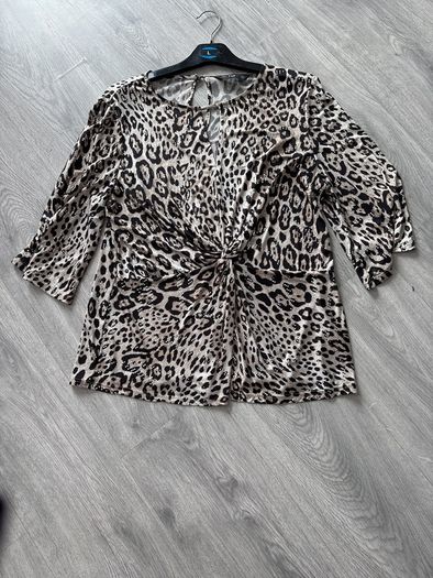 ladies top  shiny design all through it