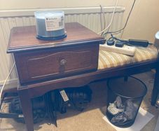 Small table with side seat