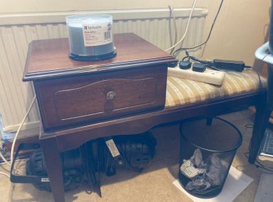 Small table with side seat