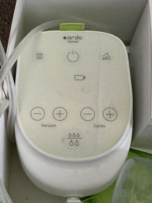 Electric handsfree breast pump