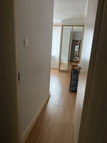 Room with double bed and attached washroom