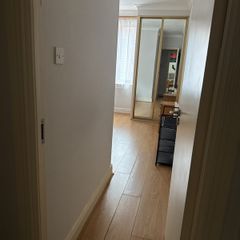 Room with double bed and attached washroom