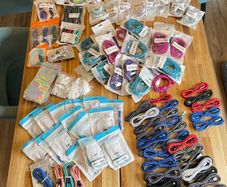 Job lot of 150 new braided fast-charging cables and extras