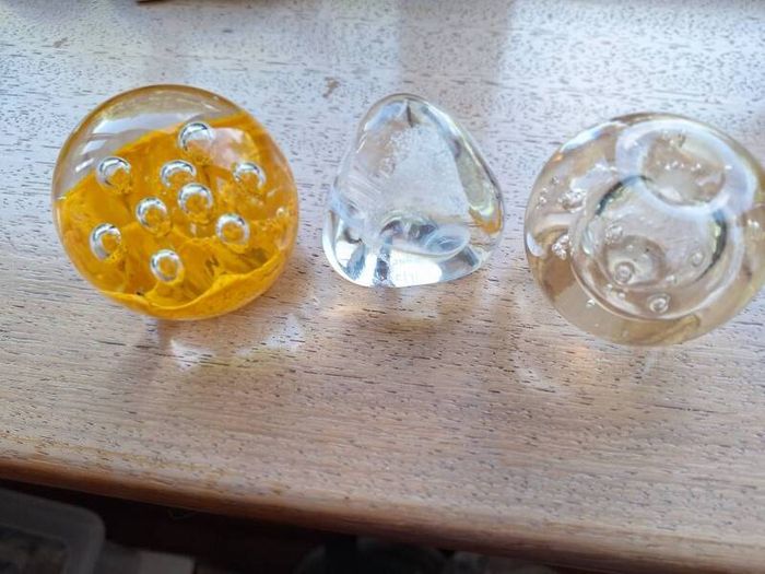 Three paper weights