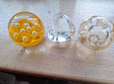 Three paper weights