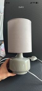 Dunned beside lamp