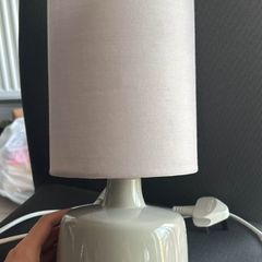 Dunned beside lamp