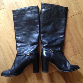 Black leather knee boots
