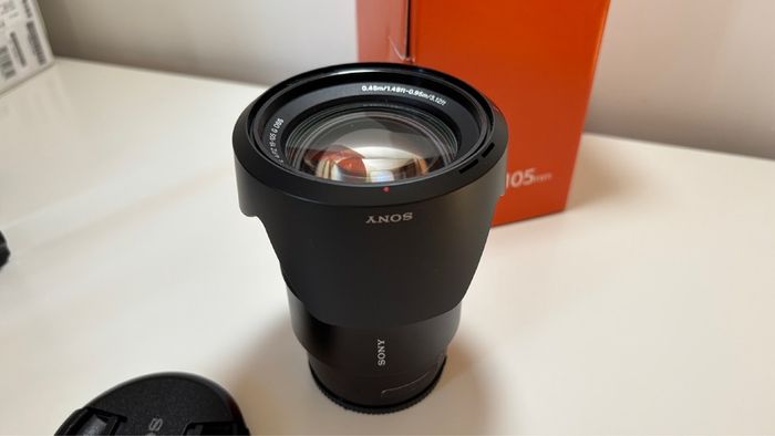 Sony ZVE-10 + Sony E 18-105mm f/4 lens (cage and 5 batteries)
