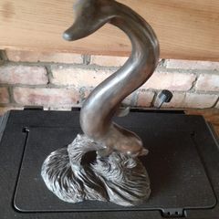 Dolphin sculpture.