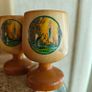 Pair of Kitsch Lourdes wooden  egg cups. Image 2