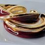 A Pair of Burgundy Oil Drip Rings with Open Ring Image 3