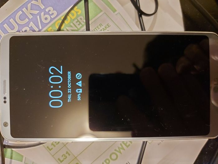 LG G6 mobile phone, 32GB, sim tray missing, excellent cosmetic condition otherwise