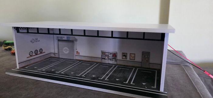 Garage for 1:64 scale toy cars, for Hot Wheels and similar models, with lights.