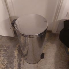 silver trash bin