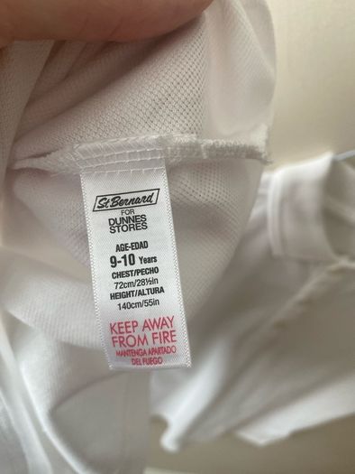 2 dunnes white polo shirts (as new) age 9-10