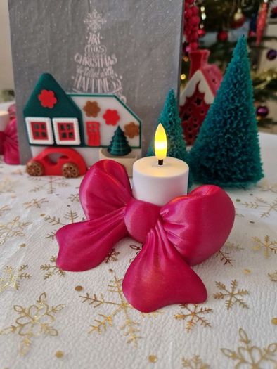 Bow candle holder