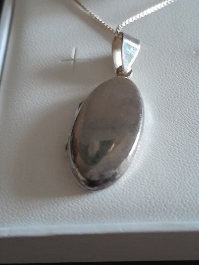 silver chain and locket