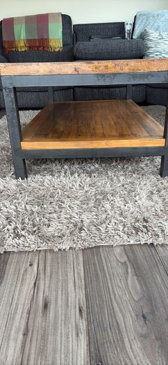 Industrial style coffee table with lower shelf