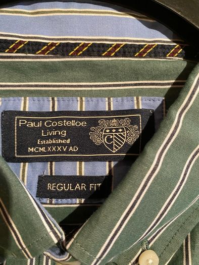 Paul Costelloe green shirt