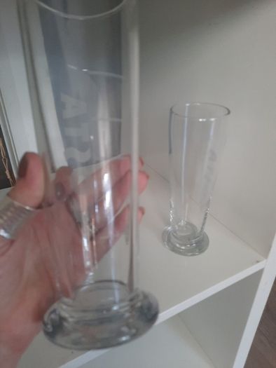 2 tall Costa glasses