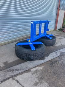 Silage wheel pushers