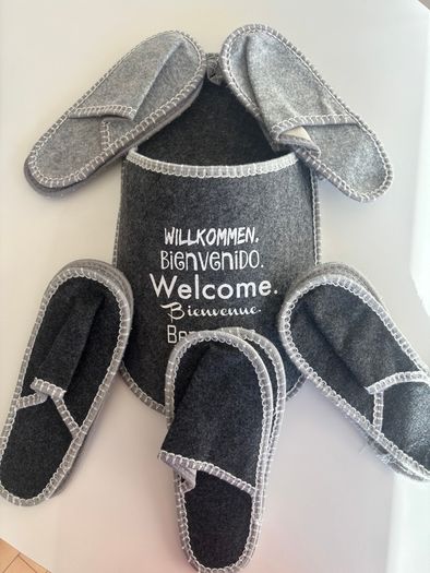 Felt guest slippers set with hanging wall organiser