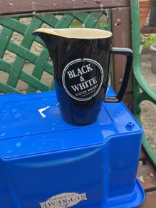 Black and white whiskey water jug