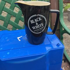Black and white whiskey water jug