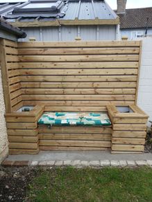 wall cladding with bench and flower boxs