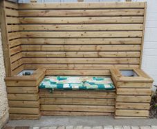 wall cladding with bench and flower boxs