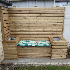 wall cladding with bench and flower boxs