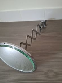Stunning art deco top quality extending arm wall mounted bathroom shaving vanity mirror.