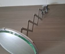 Stunning art deco top quality extending arm wall mounted bathroom shaving vanity mirror.