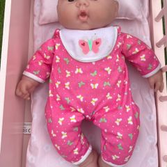 Baby doll with pink onesie EUC