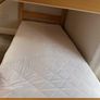 Bunk bed with attached slide and mattresses Image 2