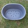 Small plastic dog bed. Image 2