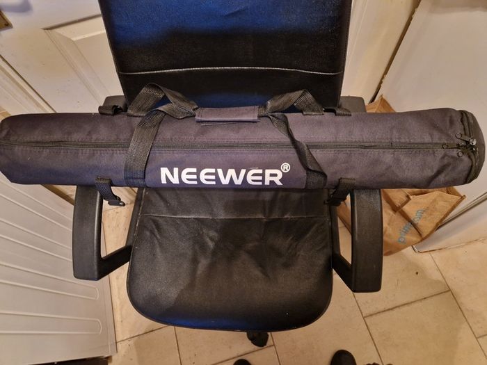 NEEWER, 2 Photography Tripods and feet and also 5ft circular Silver Light enhancer all in new condition and in lovely cases
