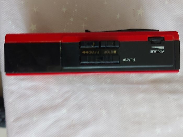 Sony Walkman and Sanyo AM-FM Stereo cassette Player, excellent cosmetic condition, no cables or batteries