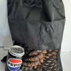 Mesh bag with pine cones